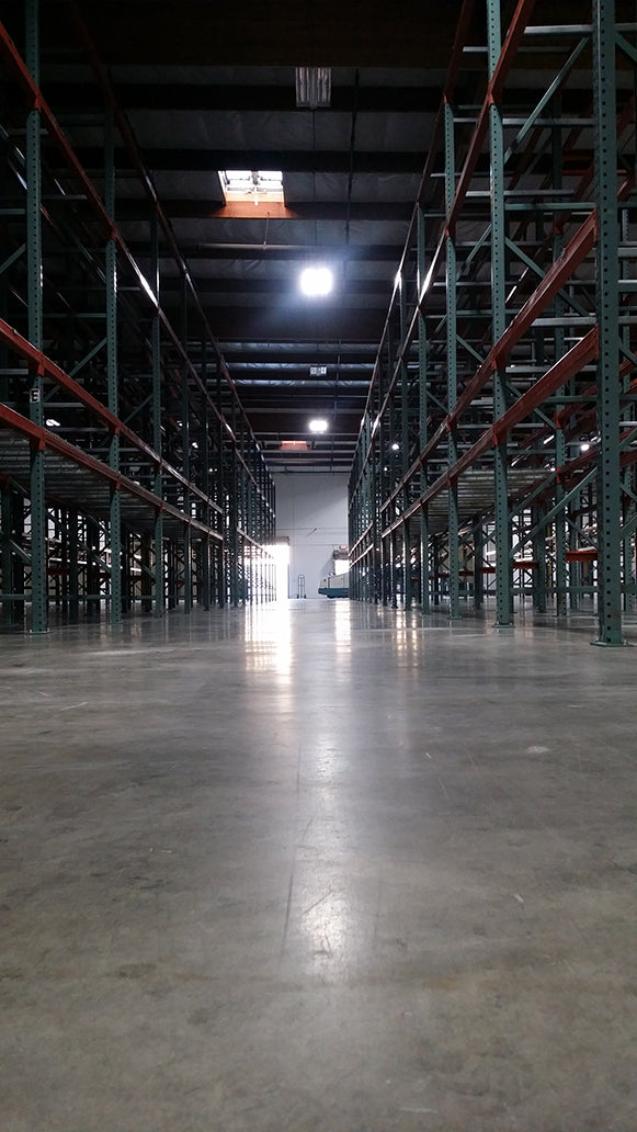 Warehouse floor scrubbing and washing
