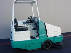 Used Tennant 6550 diesel rider sweeper